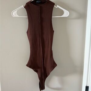 Naked Wardrobe Sleeveless Ribbed Women's bodysuit